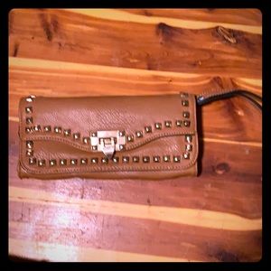 Brown studded clutch